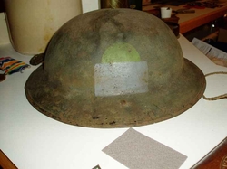 The Brodie Helmet with original PPCLI Divisional marking still visible. 